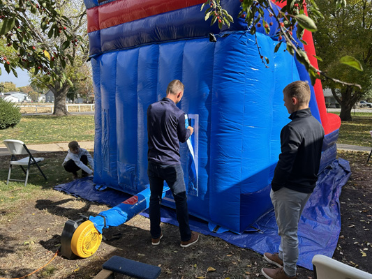 setting up an inflatable slide